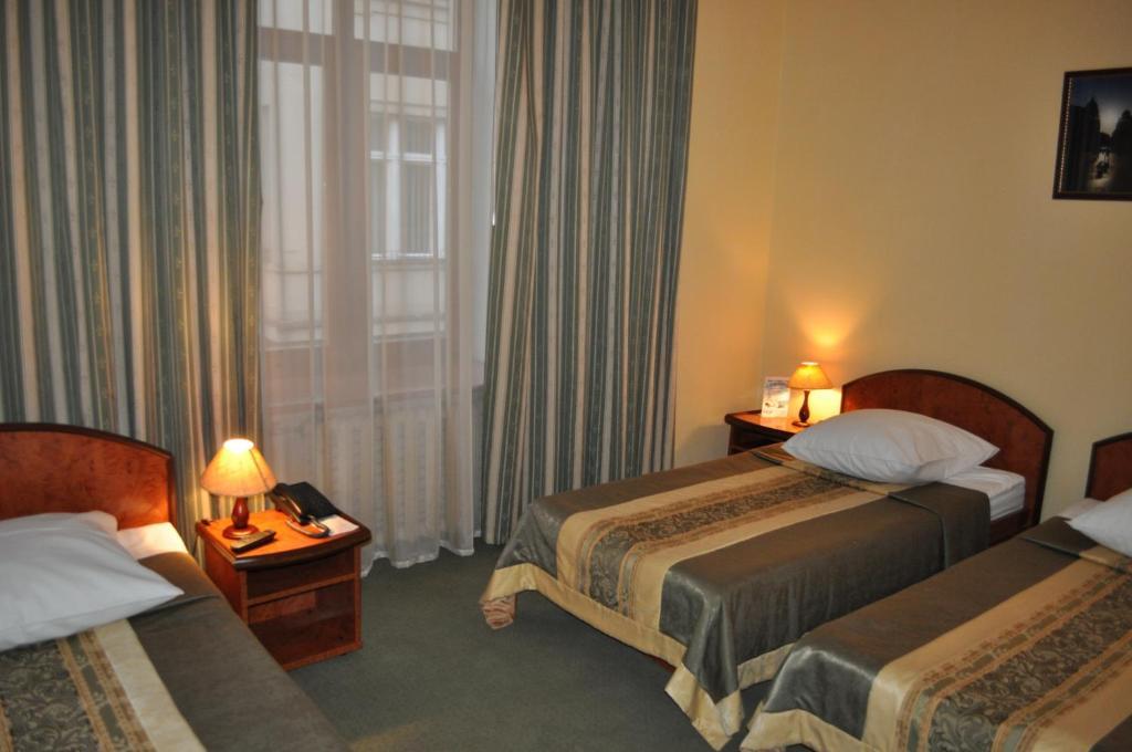 Wien Hotel Lviv Værelse billede
