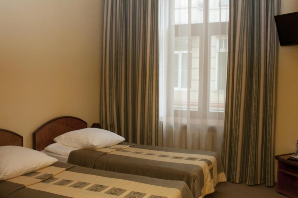 Wien Hotel Lviv Værelse billede